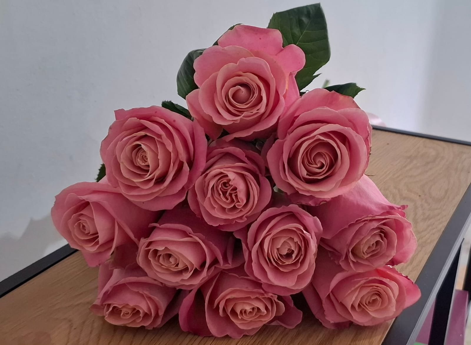 11 pink roses